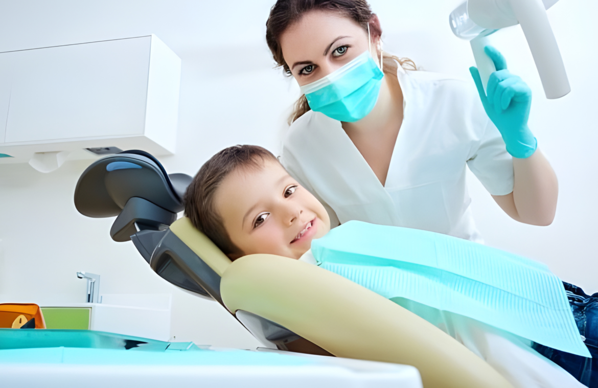 Child smiling during a gentle and fear-free dental checkup at a pediatric dental clinic