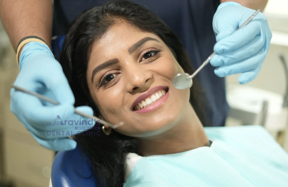 Smiling woman receiving dental checkup at Dr. Aravind’s Orthodontic and Dental Clinic in Hyderabad